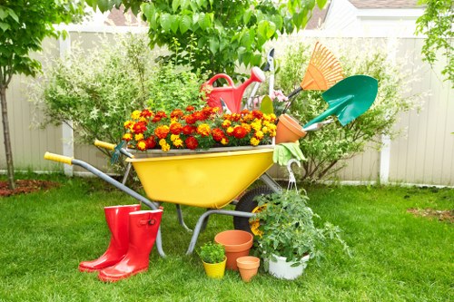 Homeowner enjoying a well-maintained Chigwell lawn